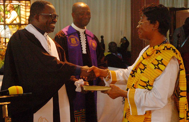 Rev. Dr Kwapong presenting a Bible to Ms Justice Sophia Akuffo at the thanksgiving service
